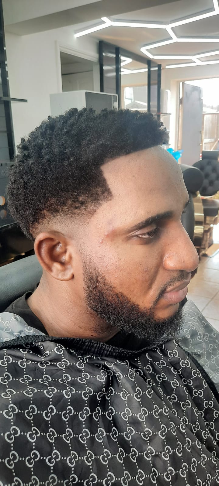 High skin fade with razor detail