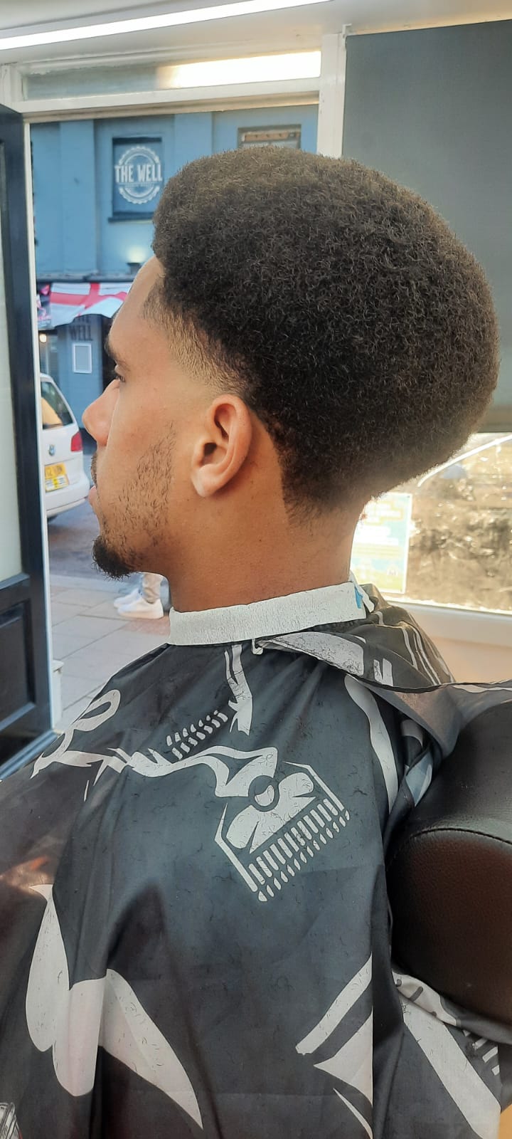 Mid skin fade with textured top